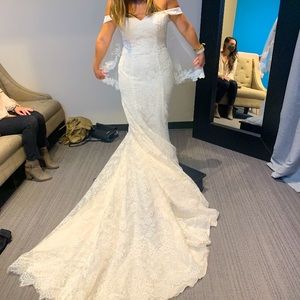 Beautiful fit to flare lace wedding dress